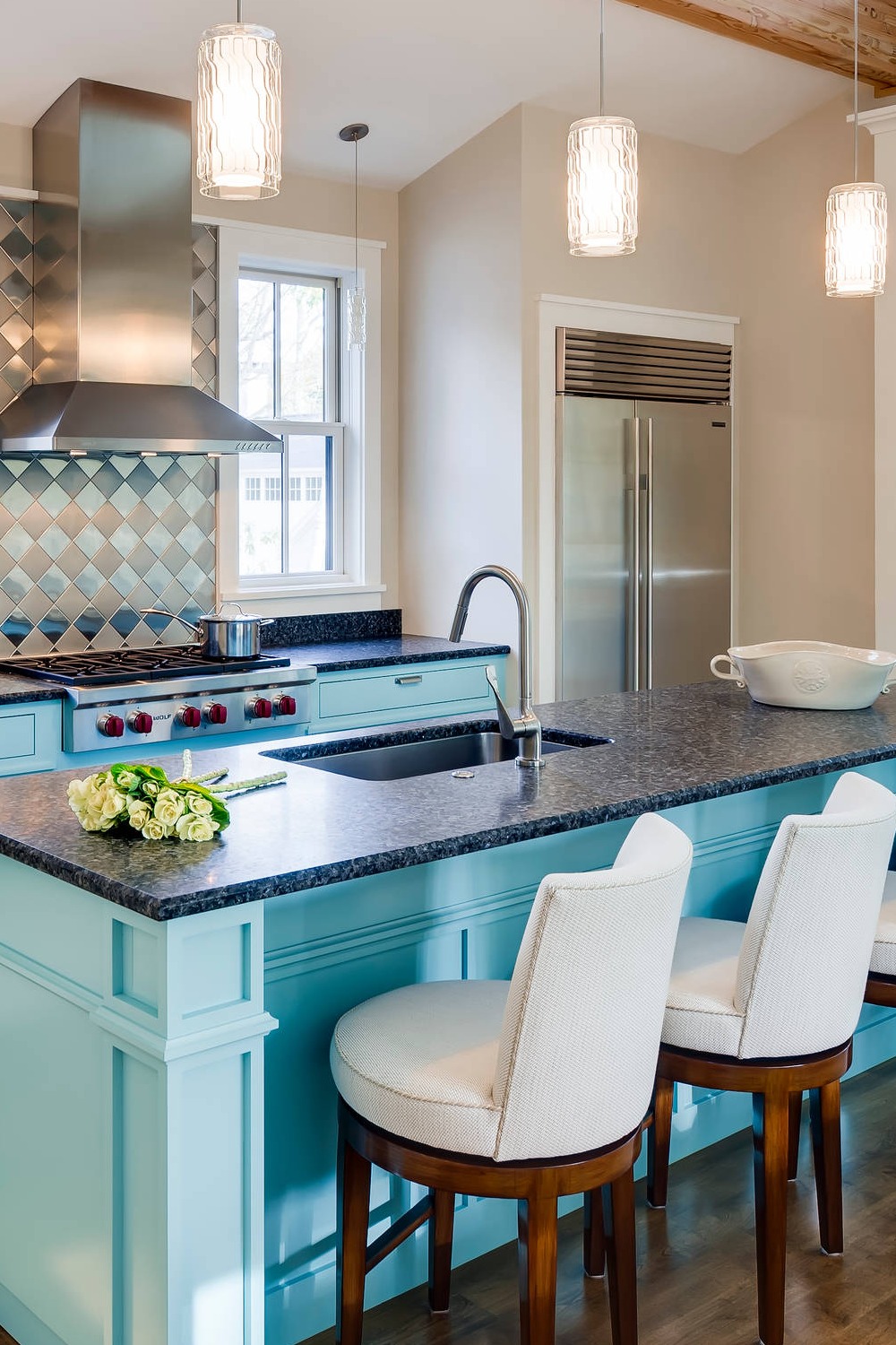 Turquoise Blue Cabinets Laminate Countertops Metal Backsplash Pendant Lighting Dark Floor