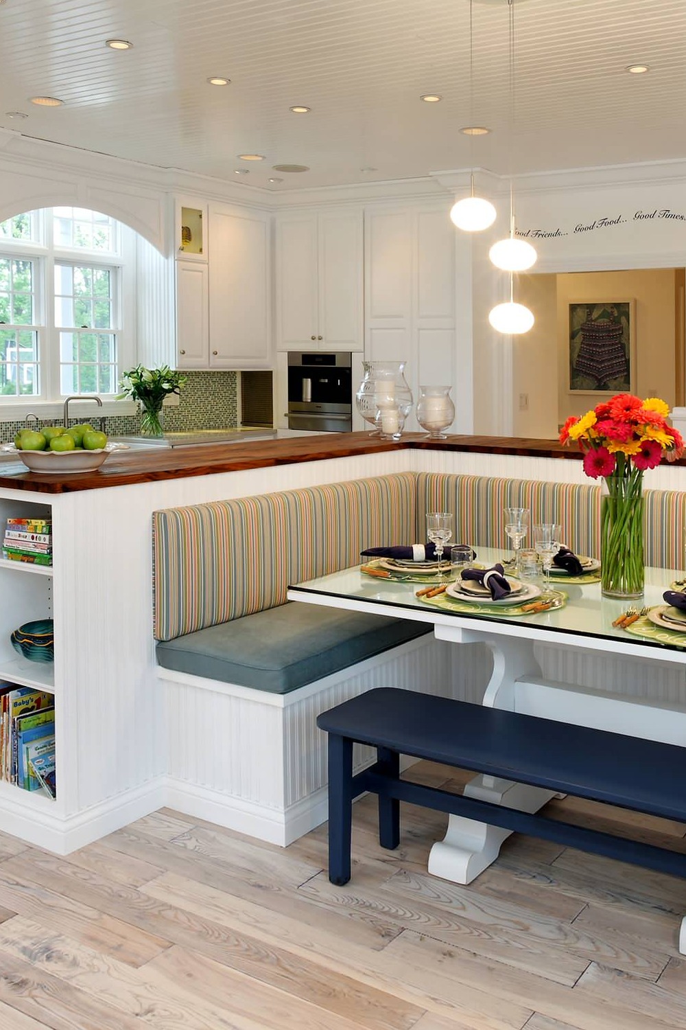 Wood Countertops Raised Panel White Cabinets Multicolored Mosaic Backsplash Pendant Lightings
