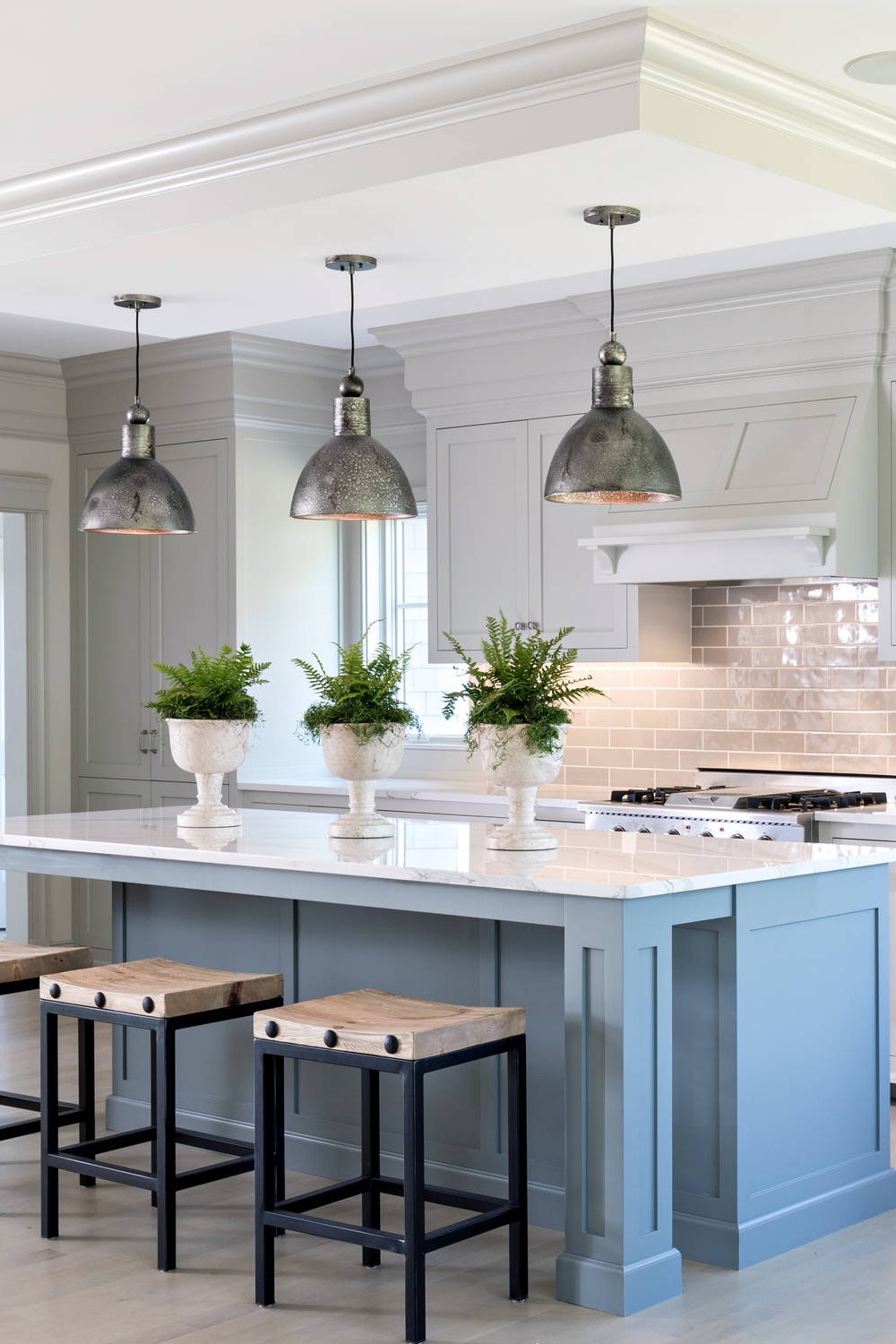 Blue Island White Kitchen Cabinetry Taupe Subway Tile Marble Countertops Light Hardwood Flooring