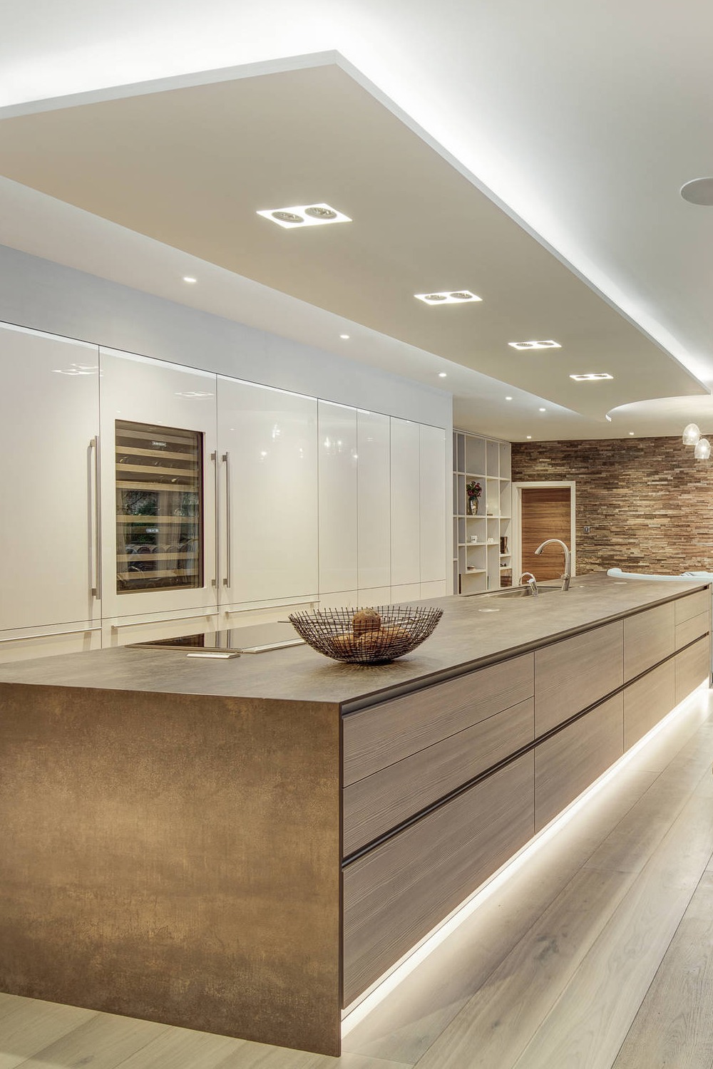 Contemporary Taupe Island White Kitchen Cabinetry Light Hardwood Flooring Countrs Stone Wall Tiles