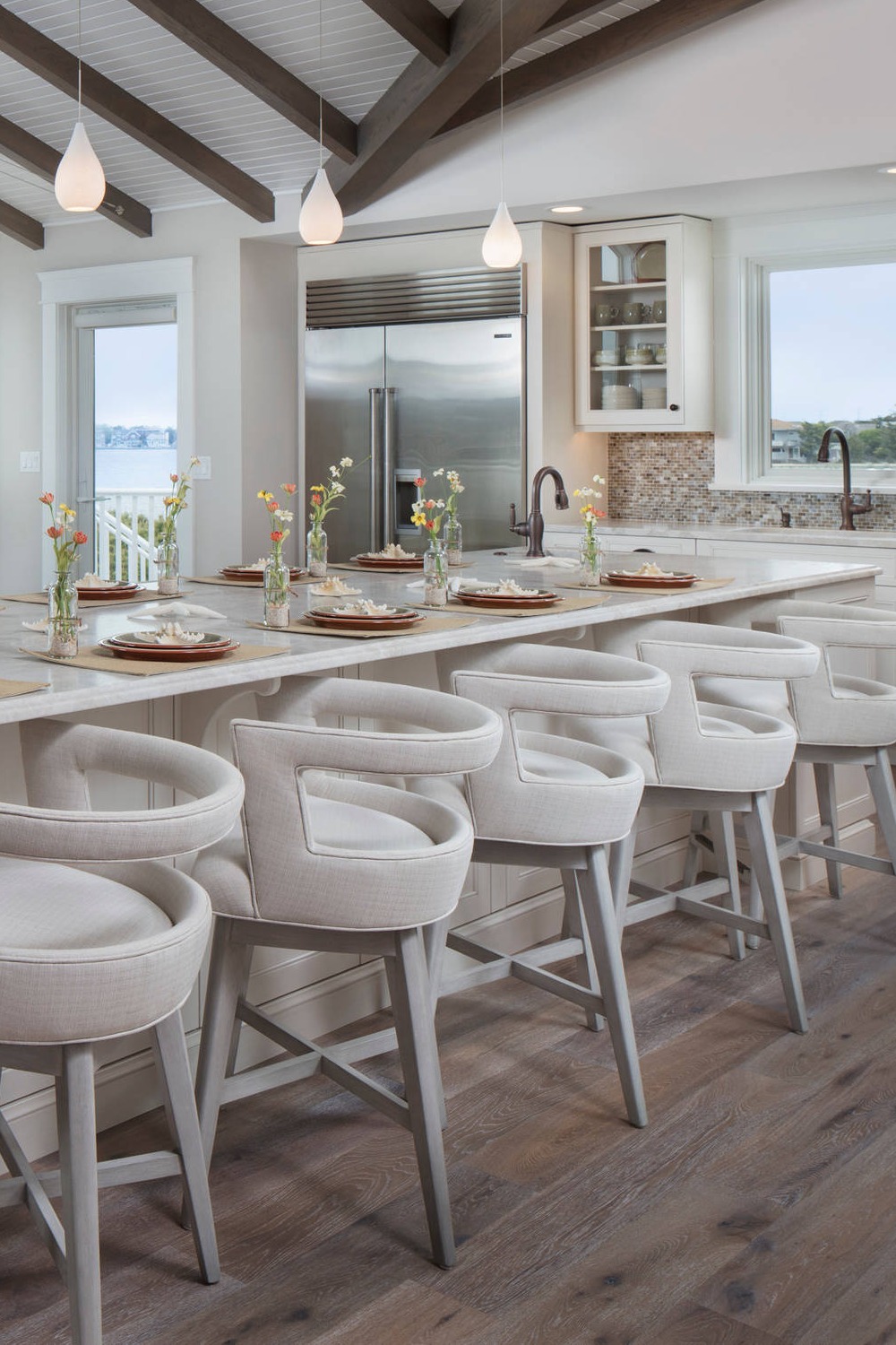 Great Room Beach Style Kitchen Island Quartzite Counters Multicolored Mosaic Backsplash White Cabinetry Medium Tone Flooring