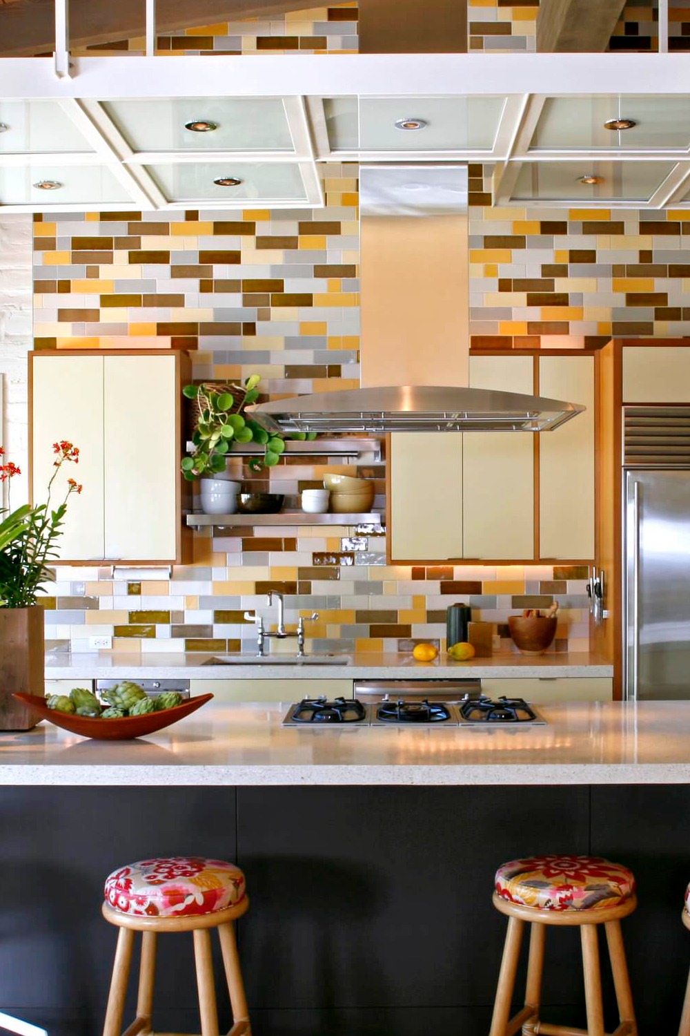 Multicolored Ceramic Tiles Terrazo Counters Beige Cabinetry Porcelain Flooring