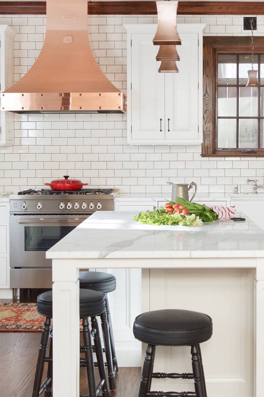 Popular Subway Tile Copper Hood Quartz Counters Hardwood Flooring Pendant Lightings Farmhouse Kitchen Traditional Contrast Colors