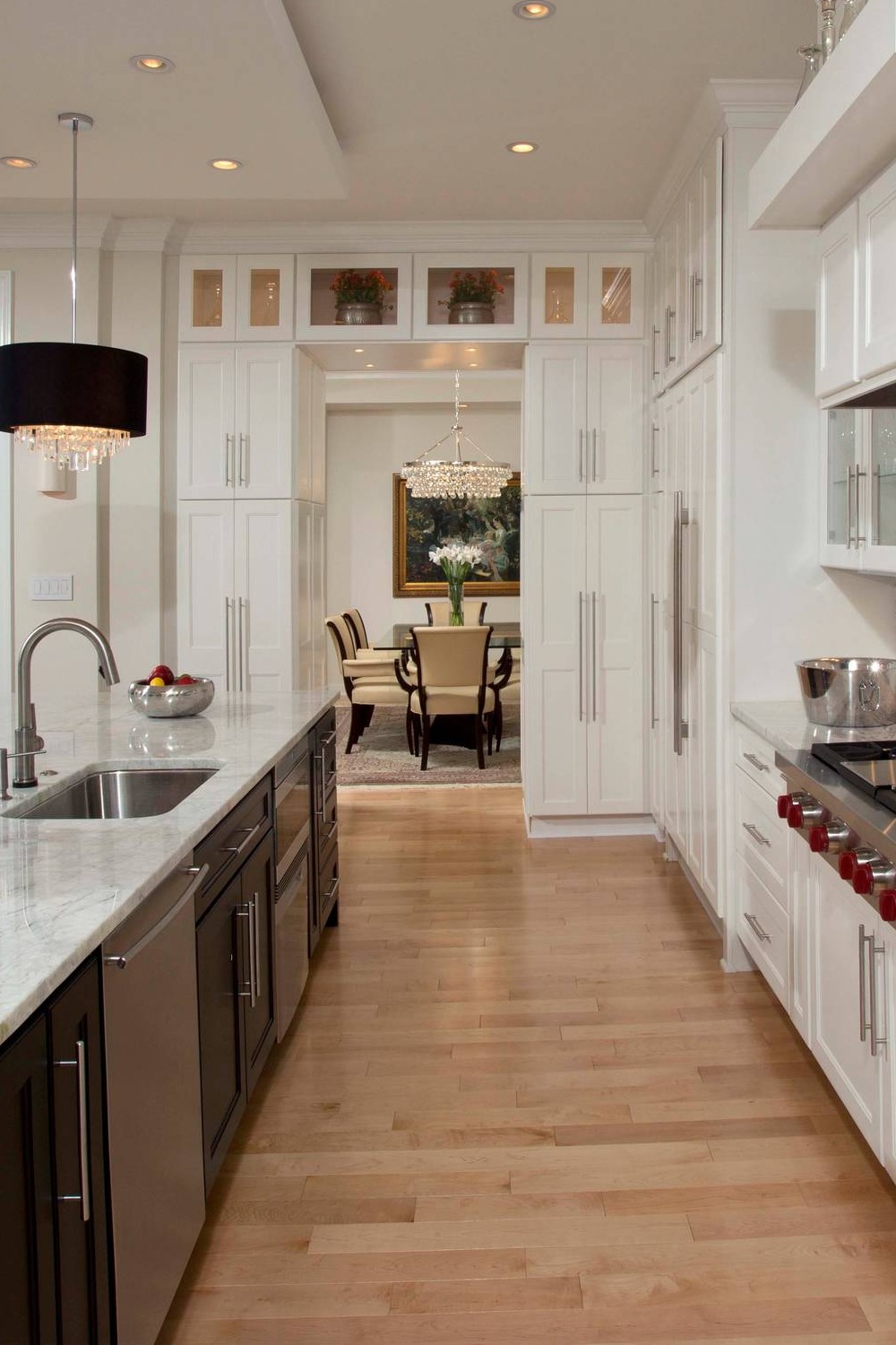 Shaker Wall Cabinets Pantry Cabinets Light Hardwood Flooring White Marble Counters
