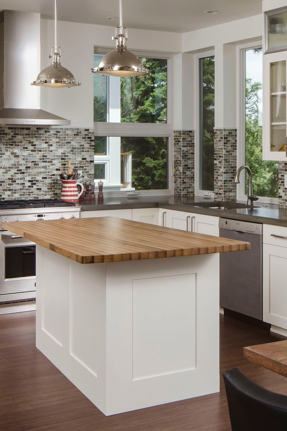 Multicolored Mosaic Tile Backsplash Warmth Wood Floor White Cabinet Butcher Block Counters