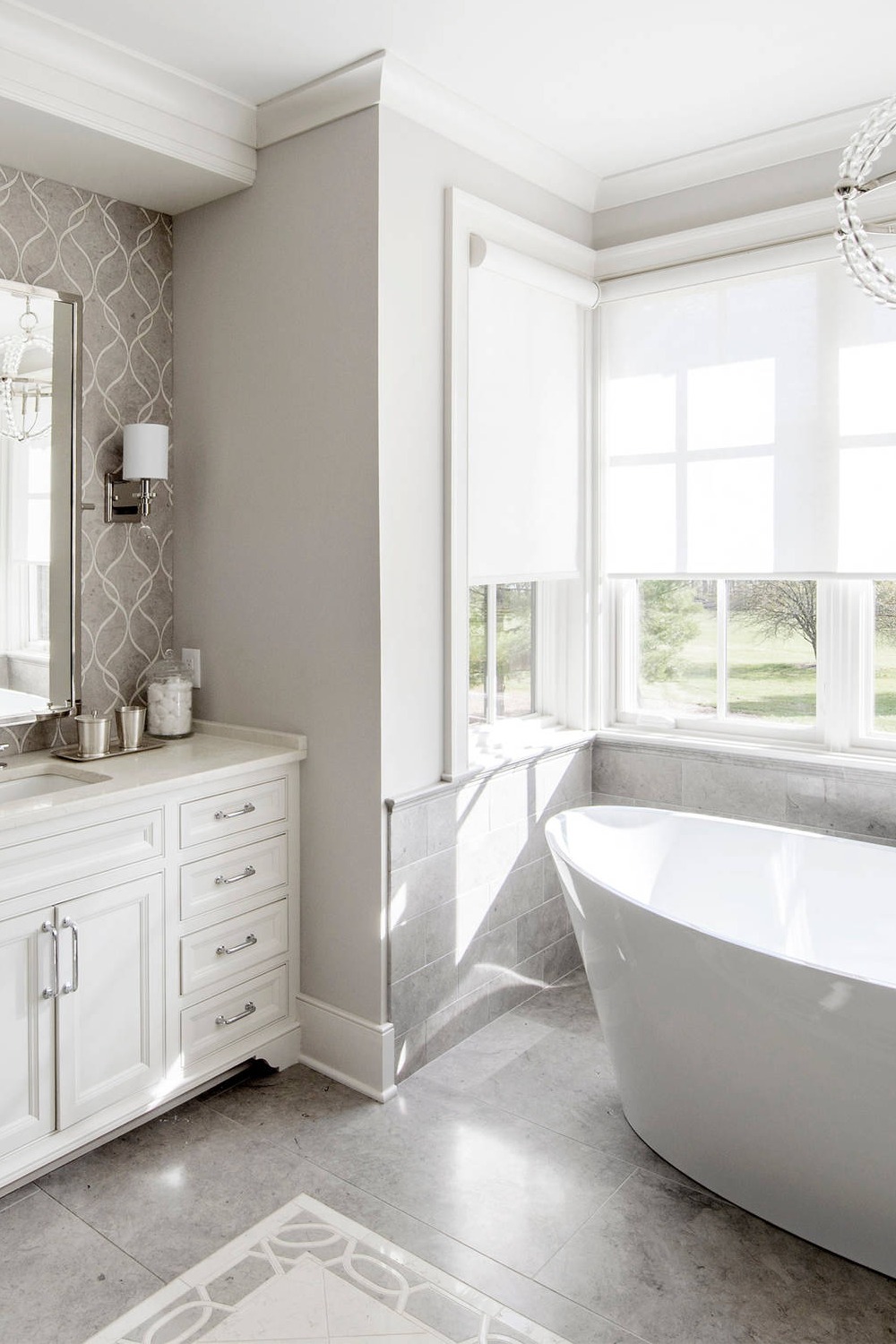 Large Format Porcelain Tile Freestanding Bathtub White Cabinetry Motif Backsplash