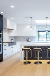 Modern Kitchen Design Ideas Light Hardwood Floor Glossy White Cabinetry Quartz Counters