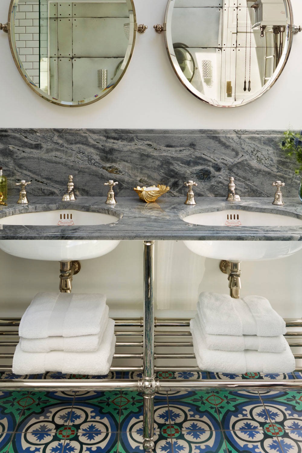 Blue Motif Floor Tiles Porcelain Sinks Marble Countertop Oval Mirrors Towel Rock