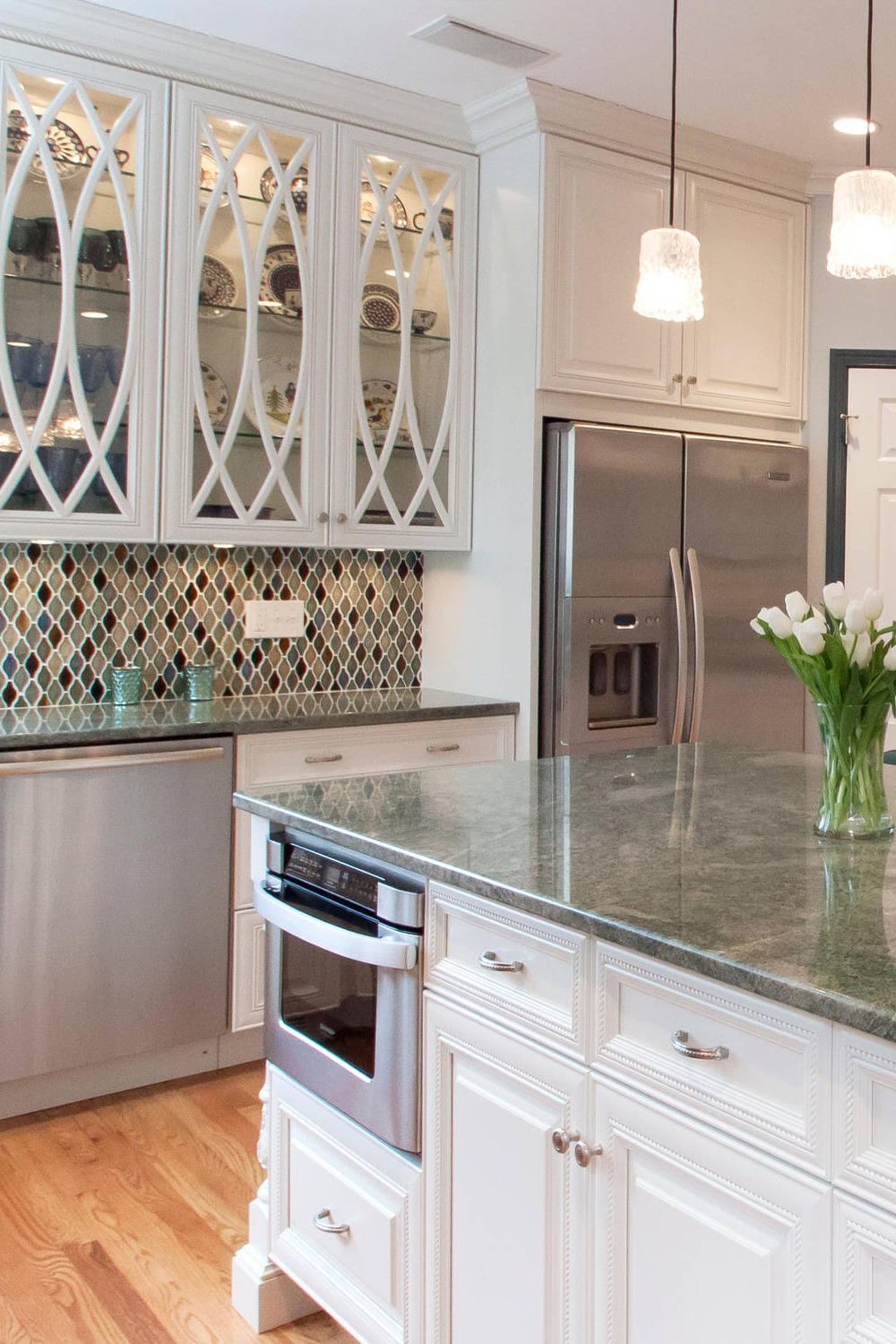 Green Granite Countertops Mosaic Tile Backsplash Hardwood Floor Pendant Lighting