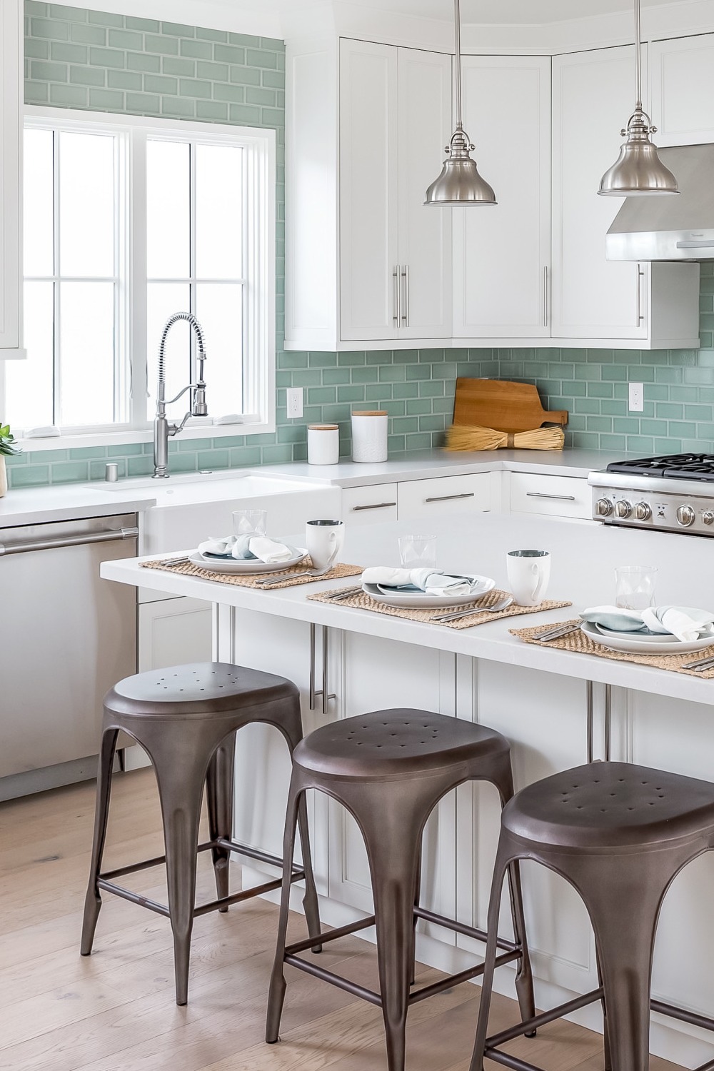 White Kitchen Stainless Steel Appliances Kitchen Cabinet With Dark Green Tile Backsplash Wood Floor