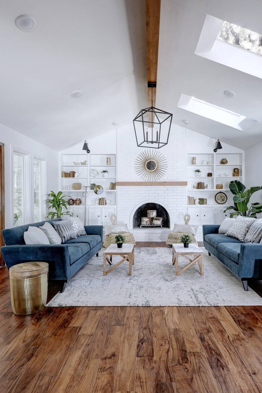 Farmhouse Living Room Natural Wood Interior Space Jute Rug Tufted Sofa Throw Pillows