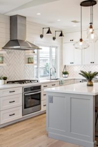 Herringbone Kitchen Backsplash Tiles White Porcelain Subway Tile Quartz Counters Pendant Lightings Light Hardwood Floor