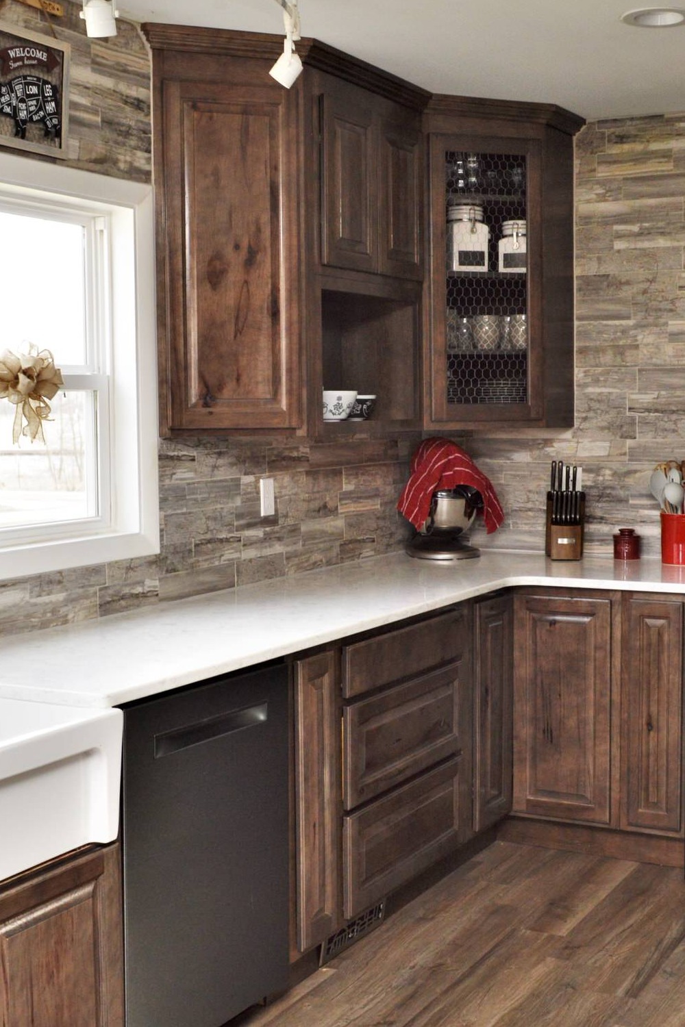 Light Brown Cabinets Quartz Countertops Recessed Panel Cabinets Spacious Kitchen Brick Walls Neutral Color