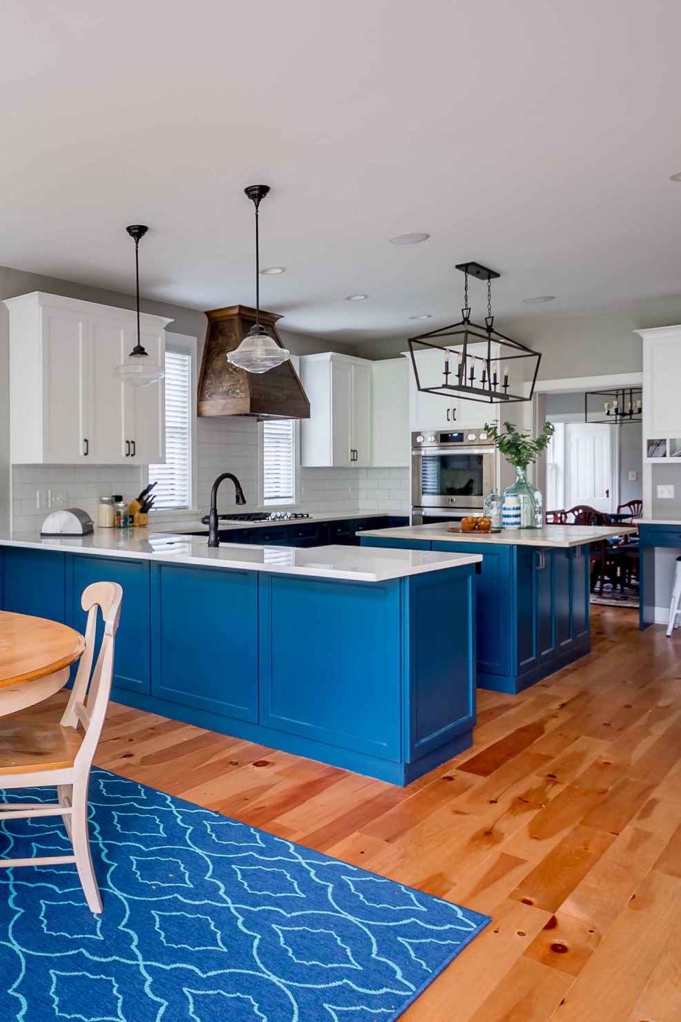 Navy Blue Lower Cabinets Two Toned Cabinets Kitchen Island White Quartz Countertop Focal Point