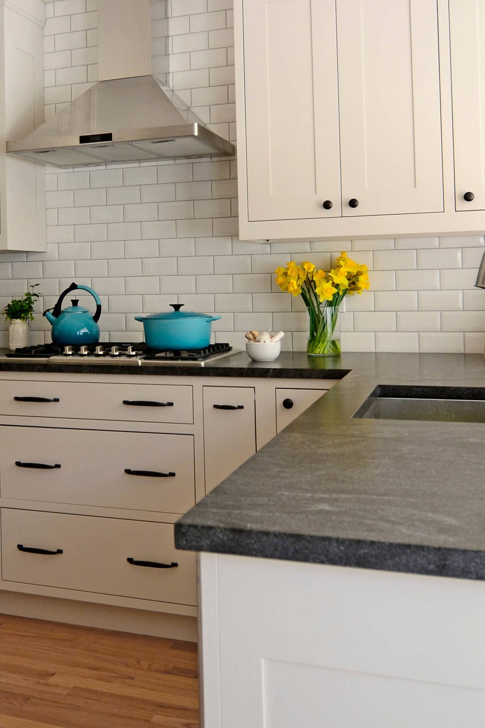 Small Space Small Kitchen Beige Shaker Cabinets White Backsplash Gray Soapstone Countertops