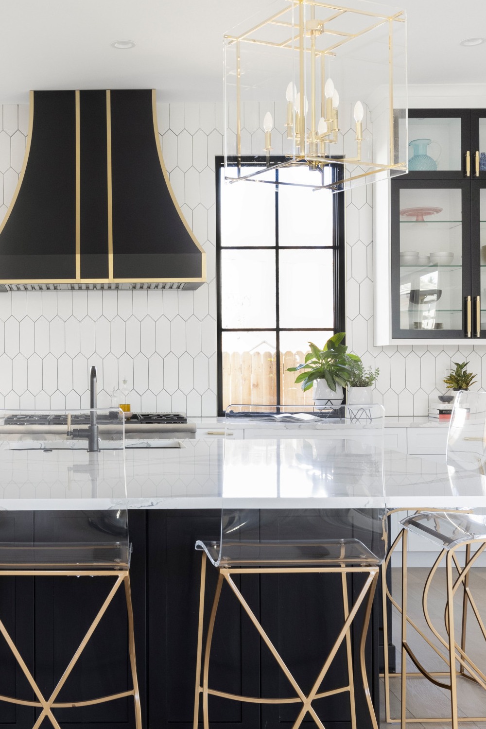 Black Cabinets Kitchen Design White Backsplash Wood Floor Quartz Countertops Gold Accents
