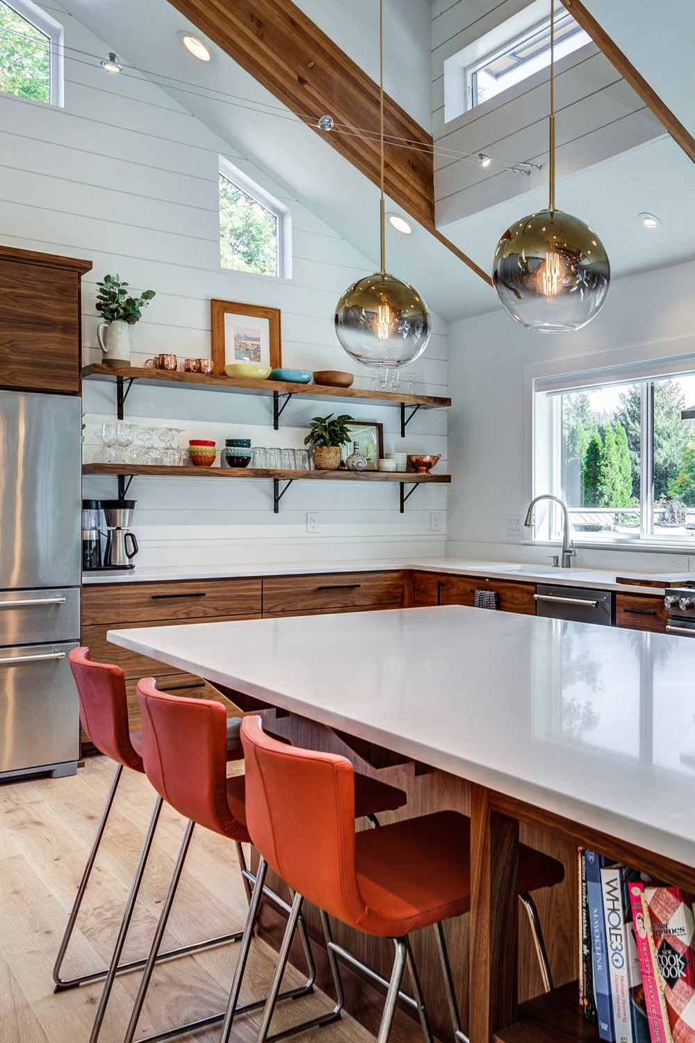 White Countertops Kitchen With Shiplap Backsplash Wood Floor Wall Board Brown Painted Cabinetry Planks Rustic Mounted