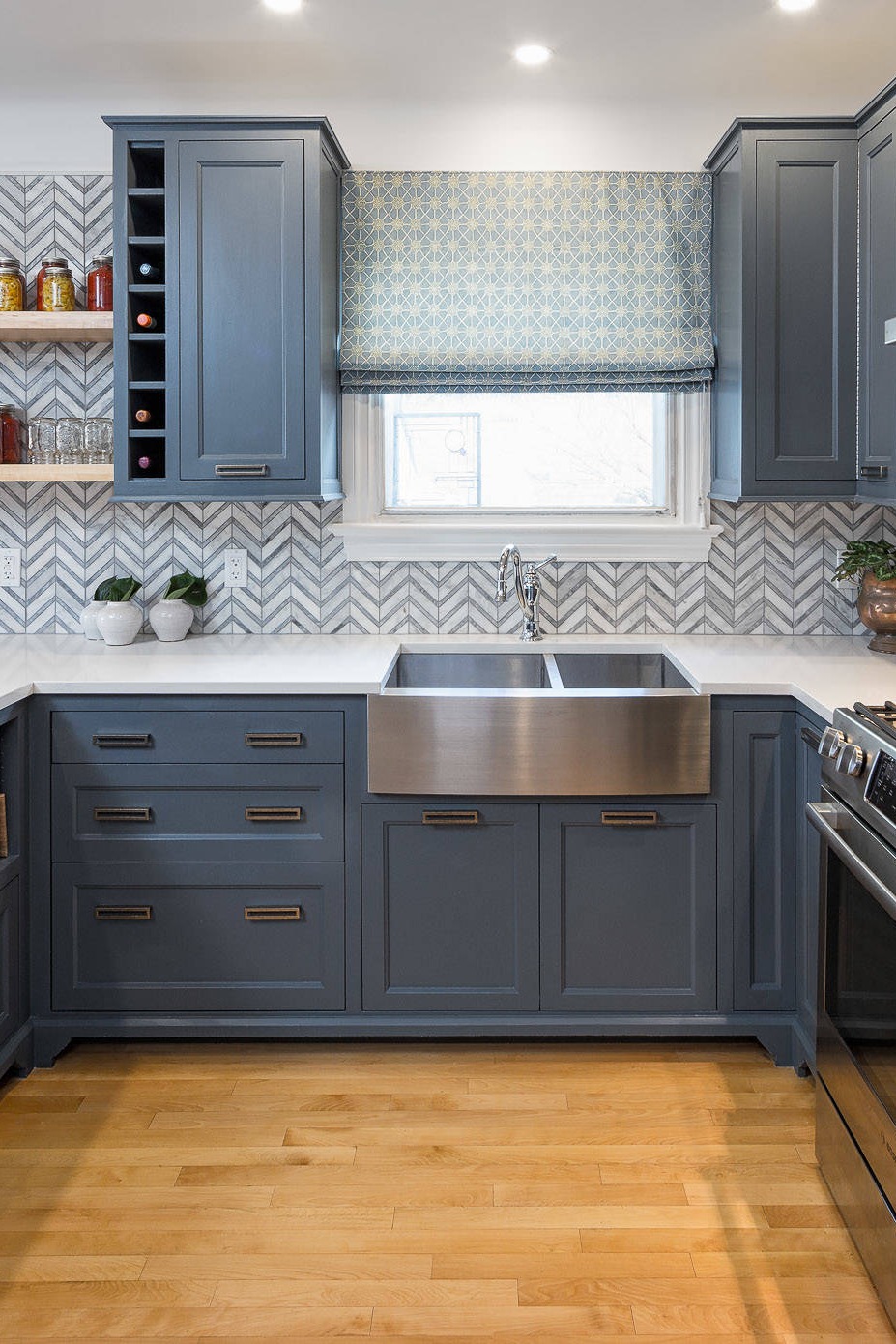 Blue Cabinets Farmhouse Kitchen Chevron Backsplash Tile White Countertops Wood Flooring Design Bathroom Add