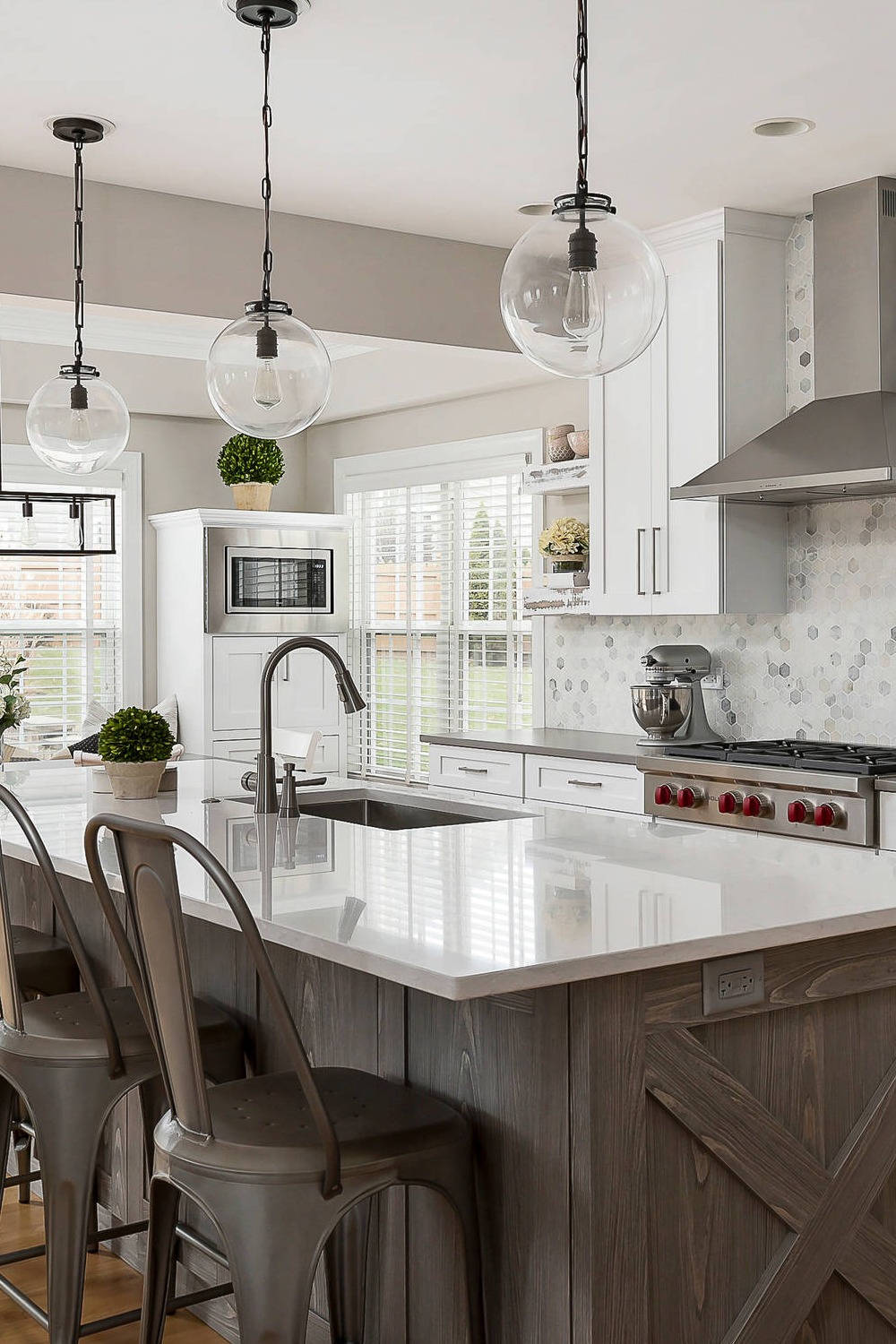 Modern Rustic Kitchen Gray Quartz Countertops Hardwood Floors Pendant Lights Wooden Elements