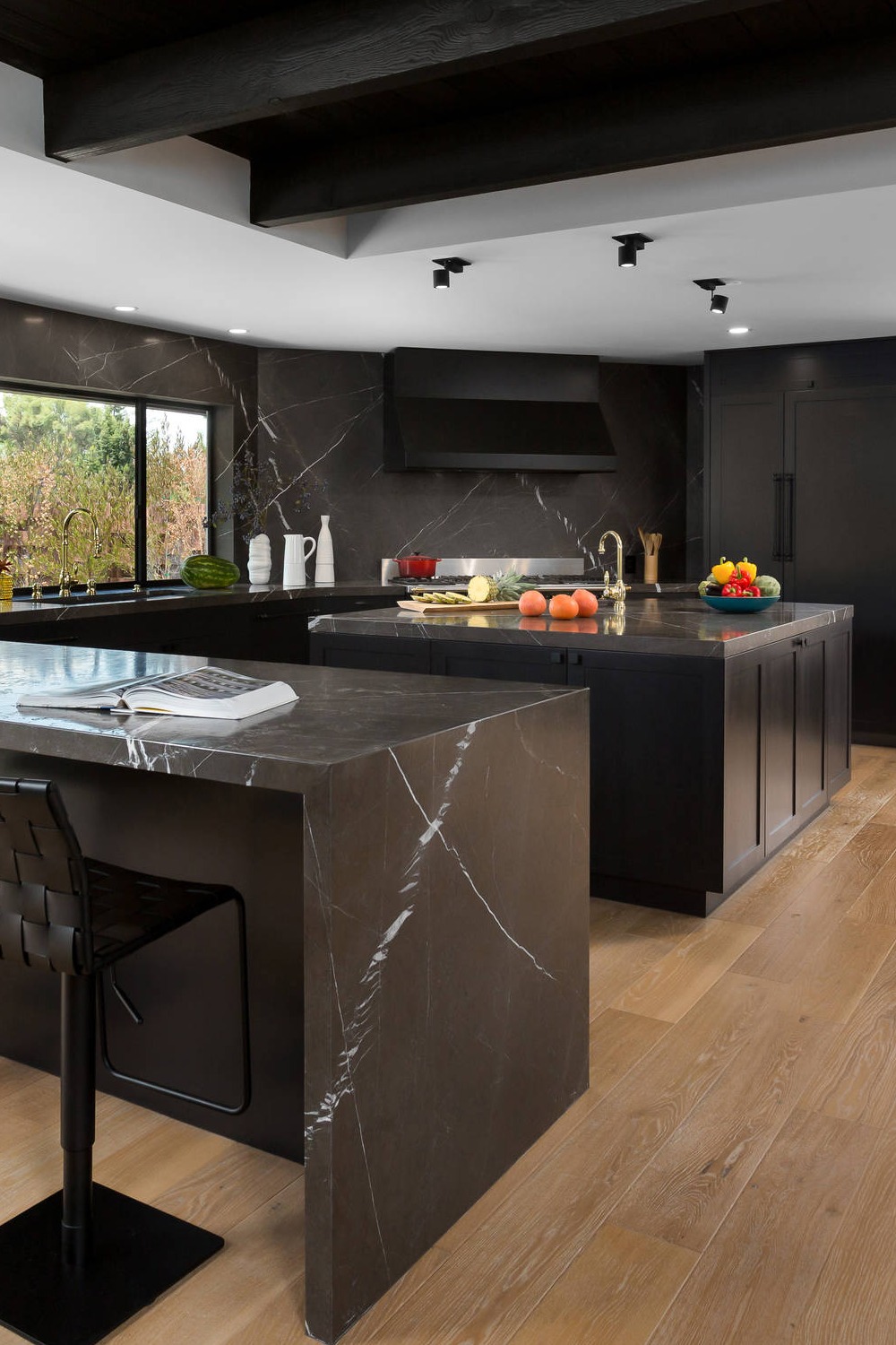 Full Height Backsplash Black Countertops Kitchen With Black Cabinets Cooking Space Waterfall Island Edge