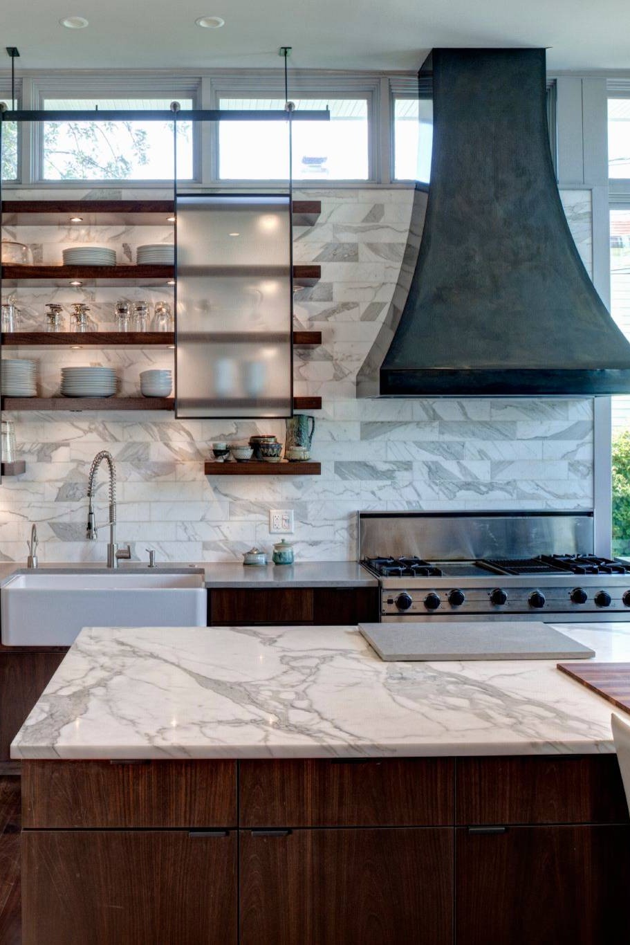 Stainless Steel Backsplash Sleek Hood Kitchen Space Marble Counters Even More Visual Interest