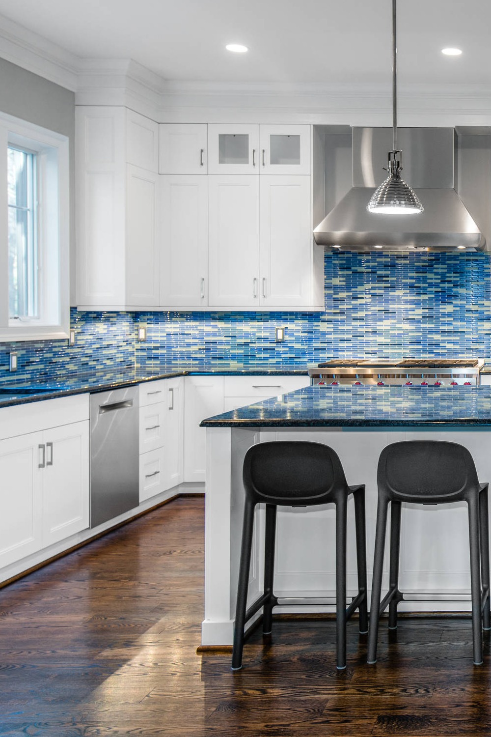 Blue Glass Tile Backsplash White Shaker Cabinets Undermount Sink Focal Point Kitchen Island White Kitchen Brick Tiles Dark Wood Floor