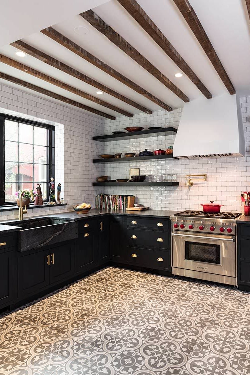 Bold Kitchen With Black Cabinets Full Height Marble Backsplash Walls Waterfall Island Countertop Stylish Paint