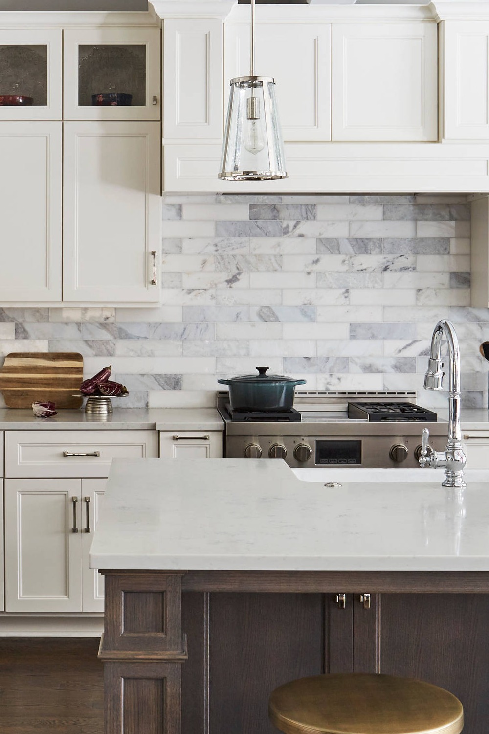 Stainless Steel Appliances Subway Tile Backsplash Honed Marble Countertops Clean Aesthetic