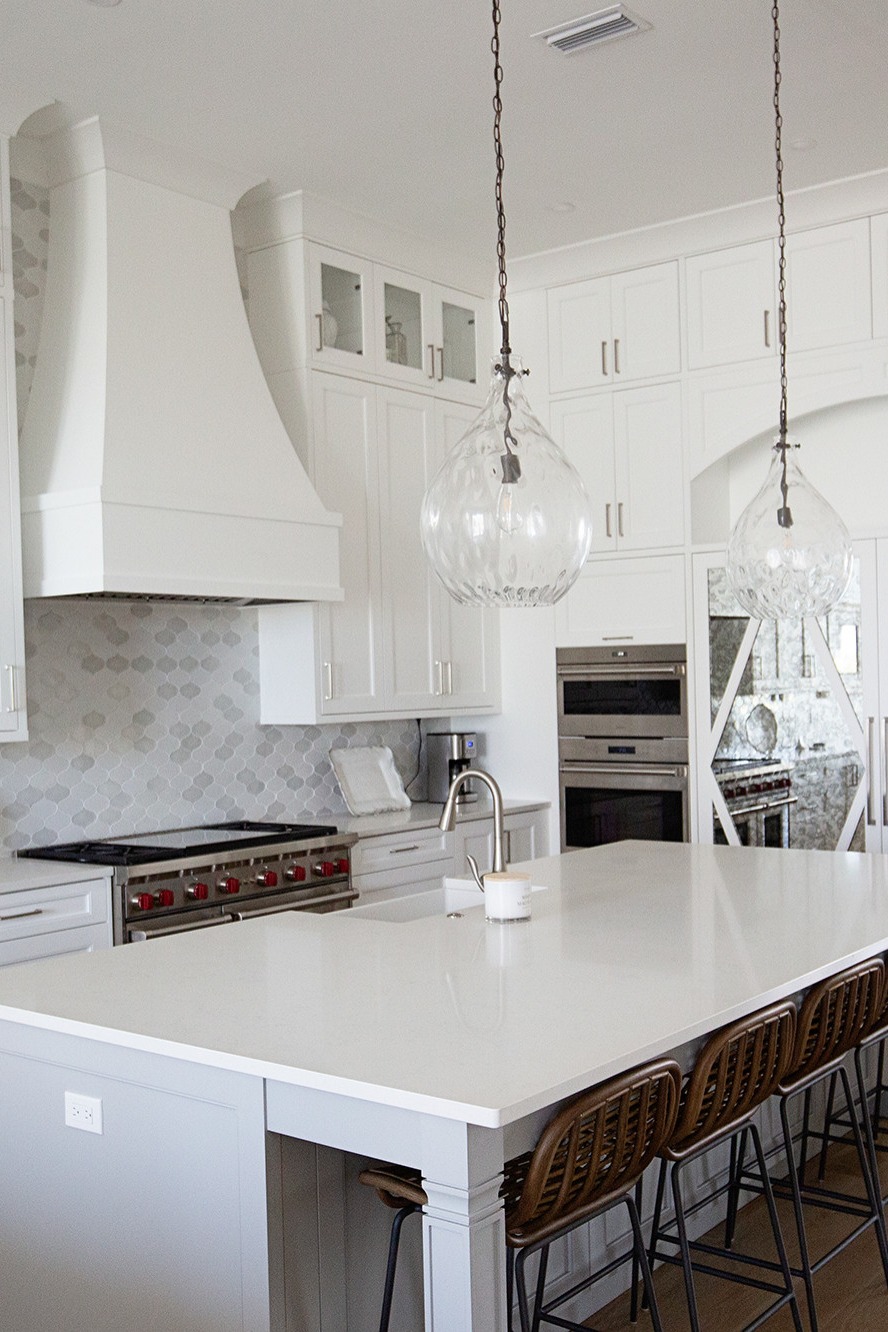 White Cabinetry Stainless Steel Appliances Granite Countertops Timeless Look Room Walls Sleek