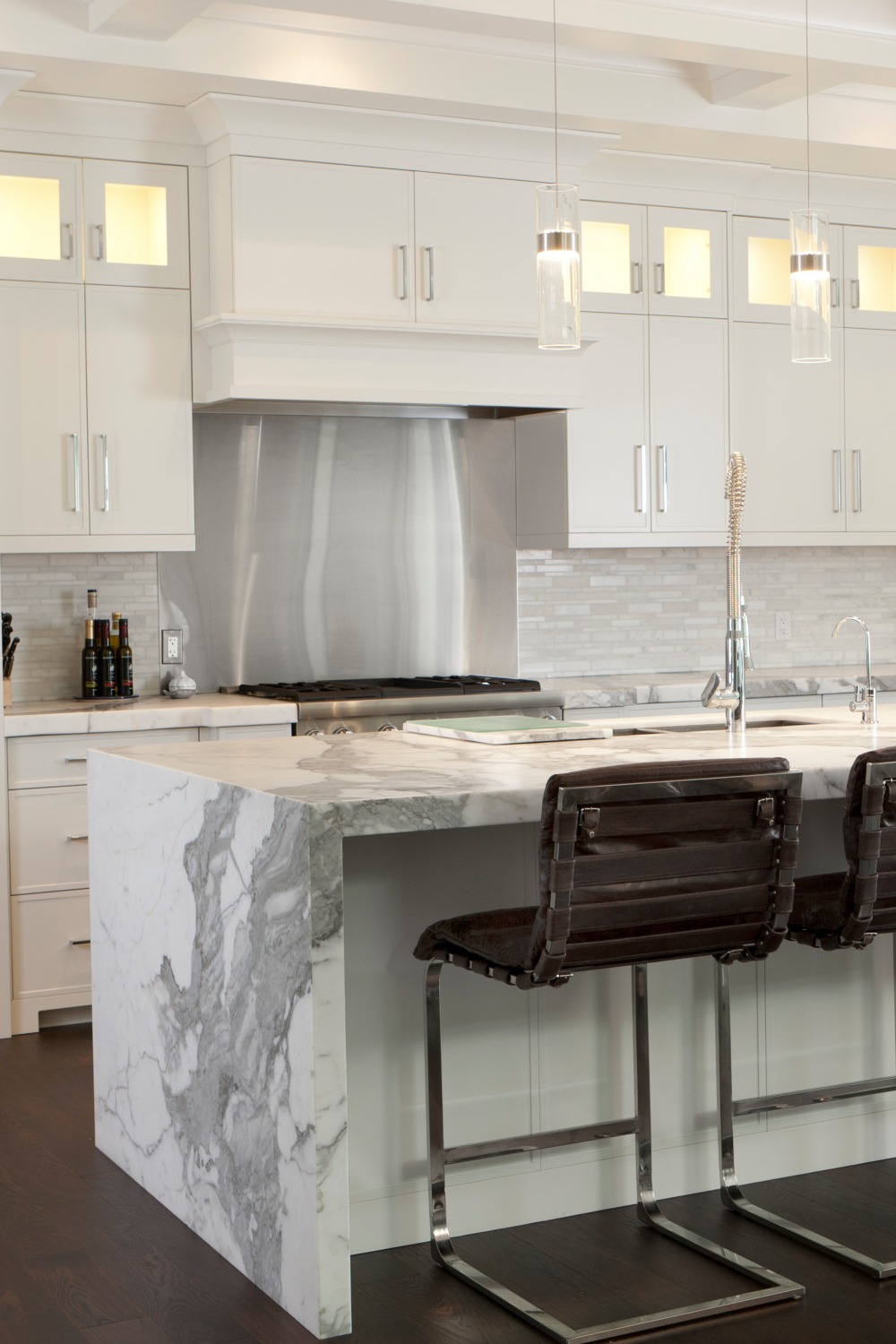 White Kitchen Cabinets Cabinetry Quartz Counters Pendant Lights Fabric Covered Chairs
