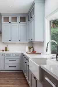 Blue Cabinets With White Countertops Farmhouse Sink Wood Floor Subway Backsplash