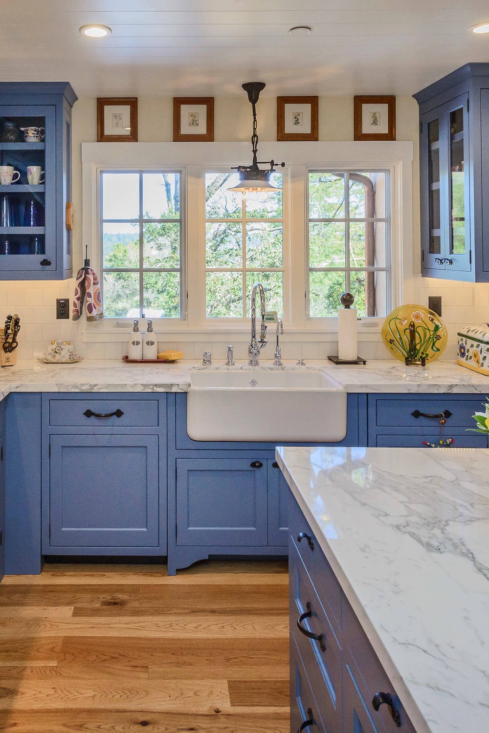 Bold Blue Cabinets White Marble Backsplash White Subway Tiles Blue Kitchen Island Farmhouse Sink