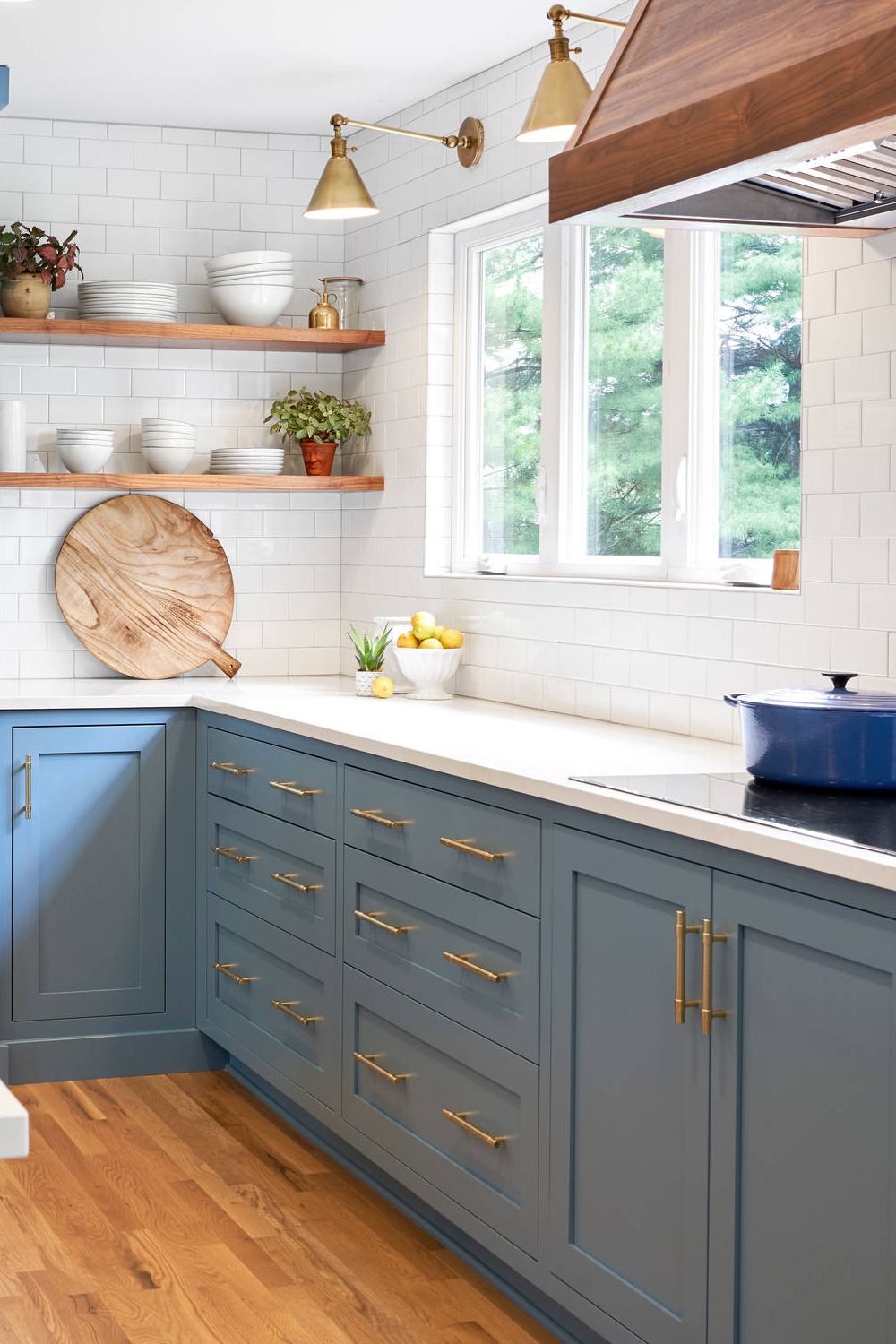 Light Blue Lower Cabinets Shaker Cabinets White Countertops Brass Handles Subway Tiles